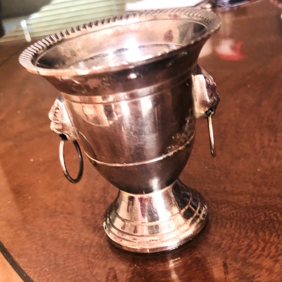 Silver tone lion head tea light urn